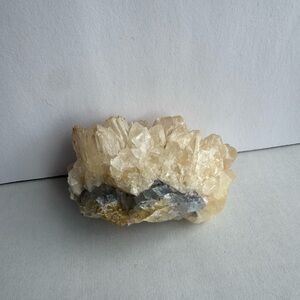 Yellow dogtooth calcite with blue and yellow fluorite crystal cluster